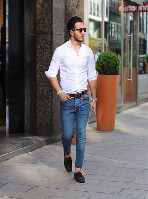 white gucci logo shirt and blue jeans outfit